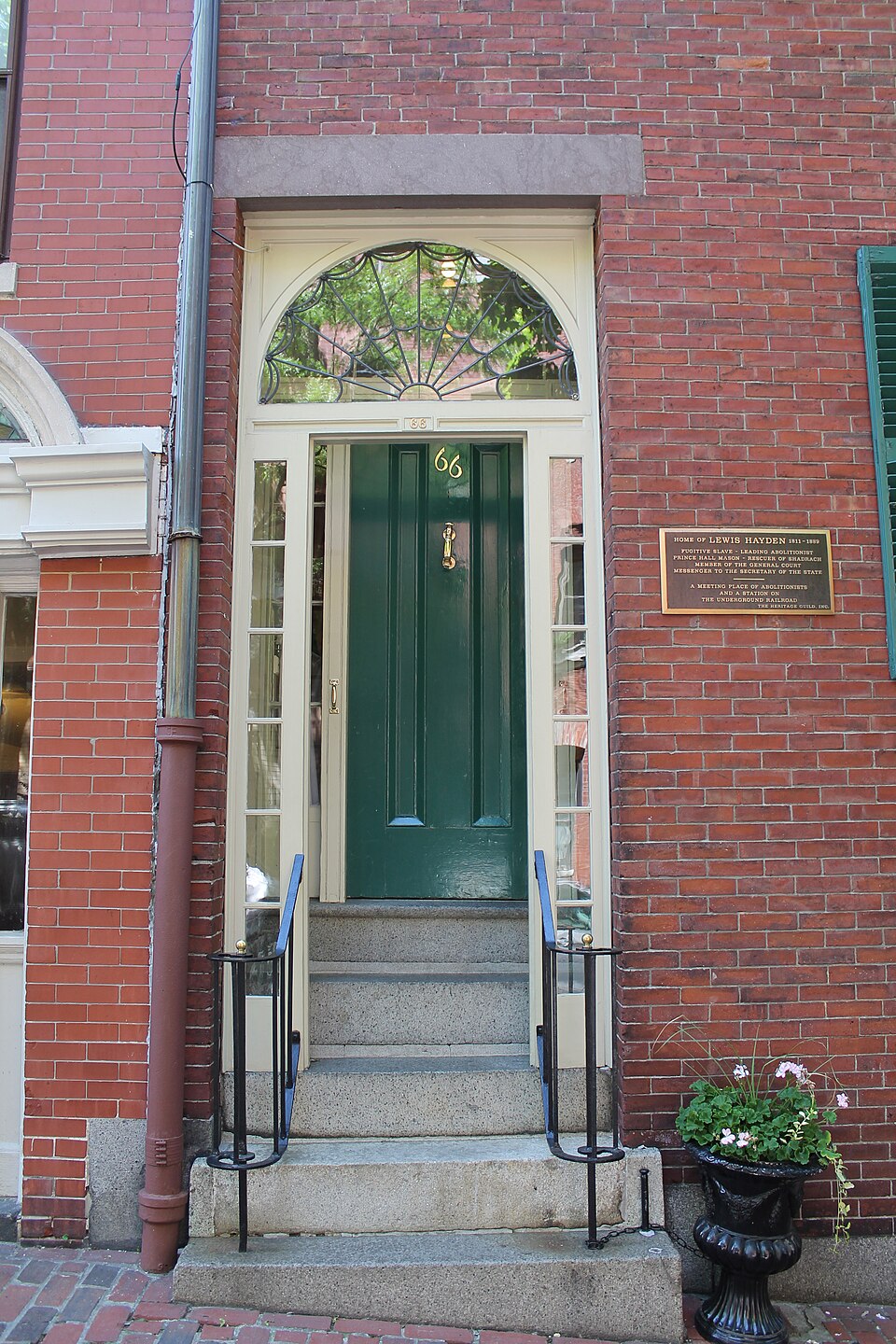 Green glazed entry and semicircular fanlight at the Lewis and Harriet Hayden House.